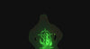 Silhouette of a man from behind, the glowing green mammoth design on his shirt